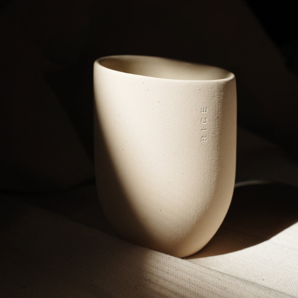 Handcrafted ceramic jar for Kensla Studio’s Rice fragrance, a scent inspired by mindfulness and the beauty of small, meaningful moments. Yili collab